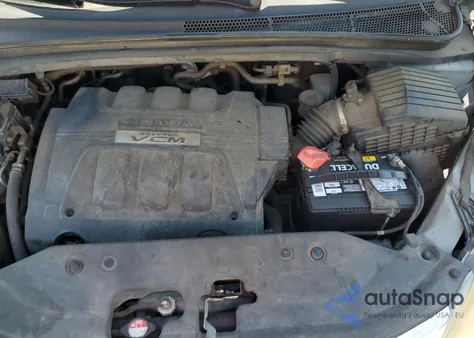 2010 Honda Odyssey Exl z USA, uszkodzony, nr VIN 5FNRL3H79AB077745